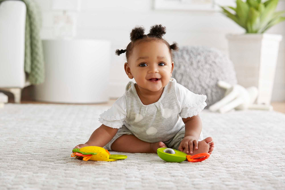 Fisher-Price lettuce and tomato teethers for curious babies' grasping and exploration