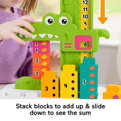 Fisher-Price ten stacking blocks store neatly in the alligator base.