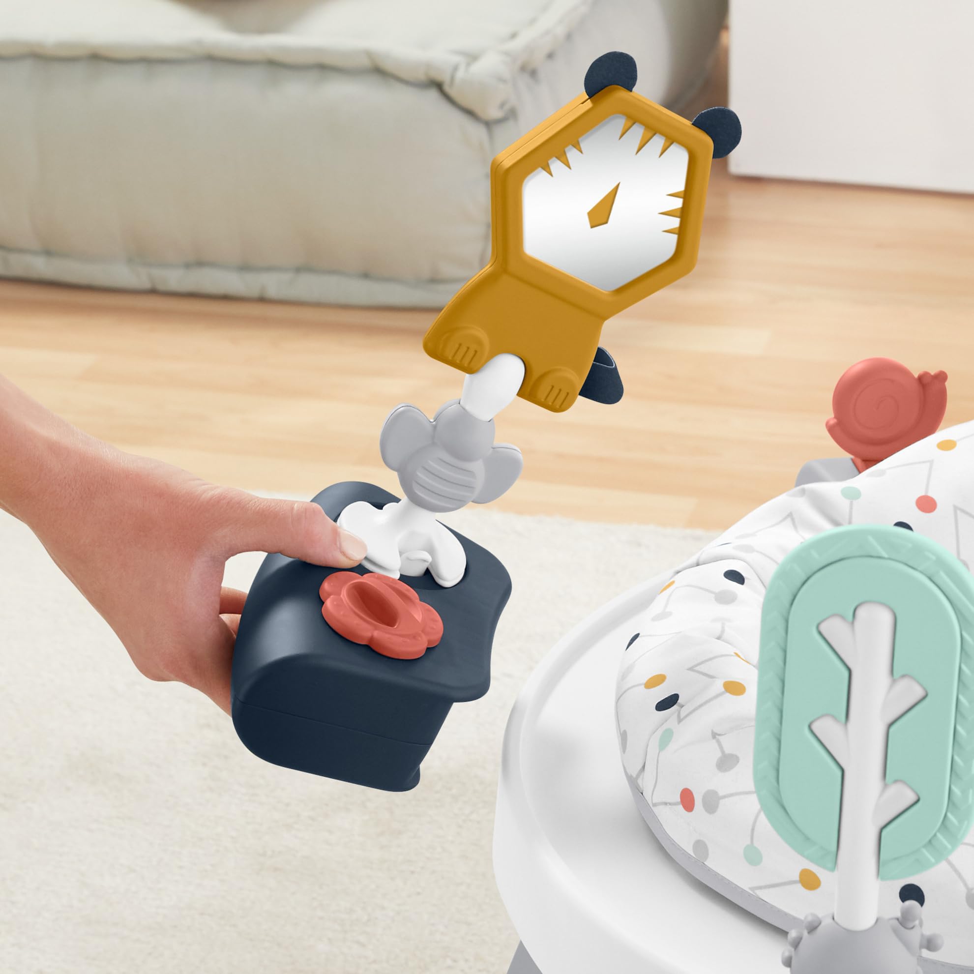 Fisher-Price toddler-play-table enables standing exploration with a stable surface.