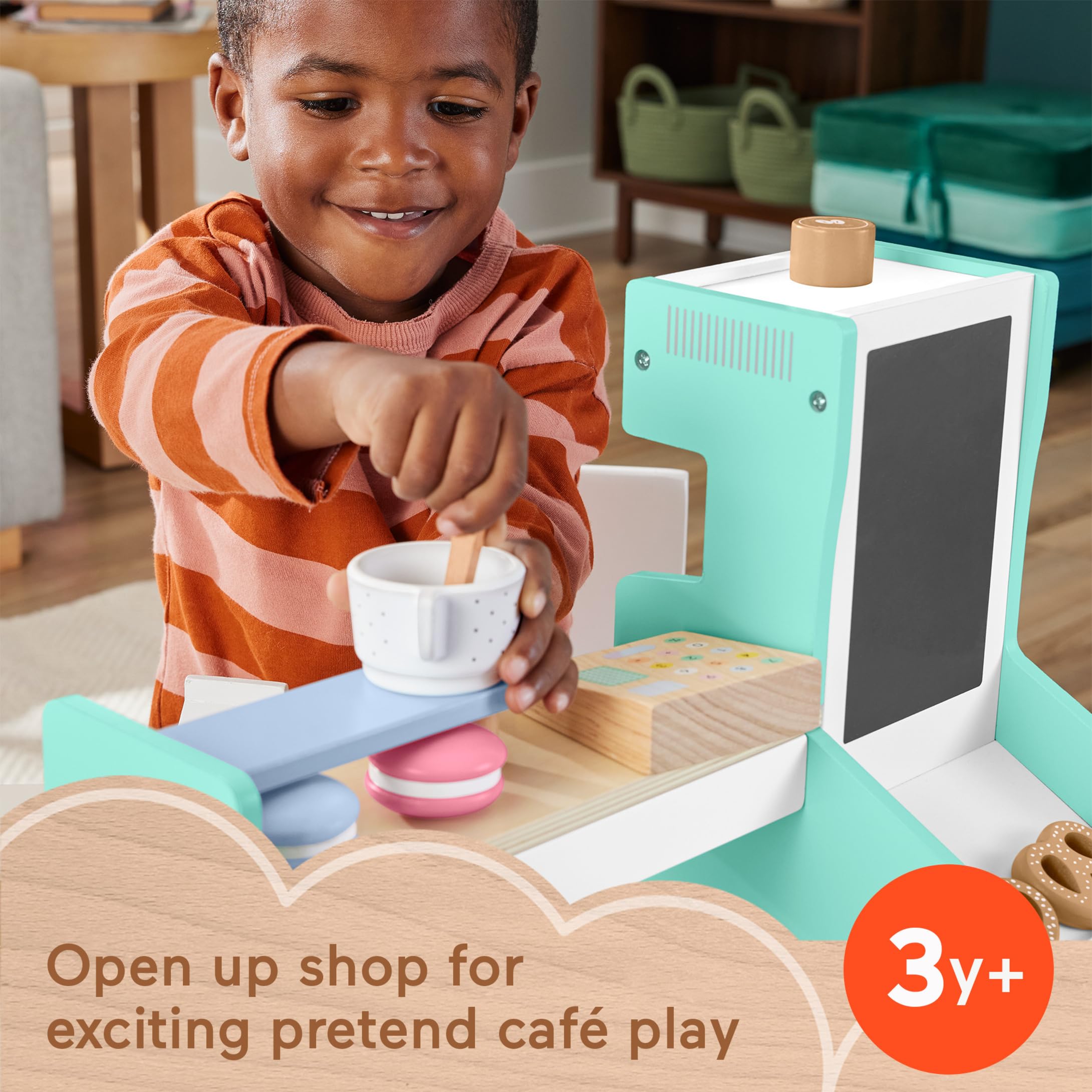 Fisher-Price wood coffee cup supports sharing and pretend beverage service.