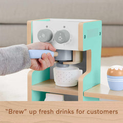 Fisher-Price wood espresso pod offers tactile, cafe-style pretend cafe experience.