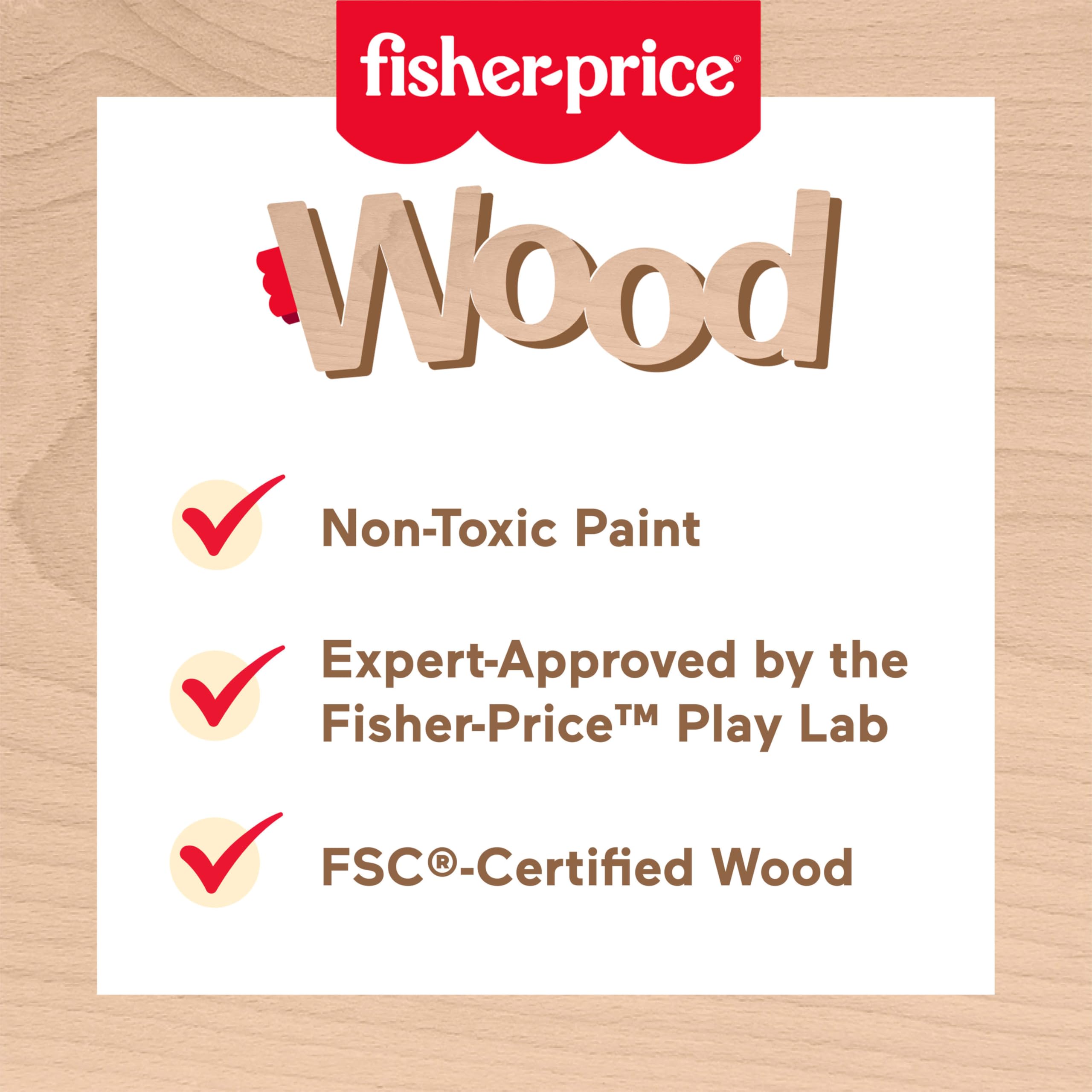 Fisher-Price wood spray bottle for watering pretend plants and motor skills.