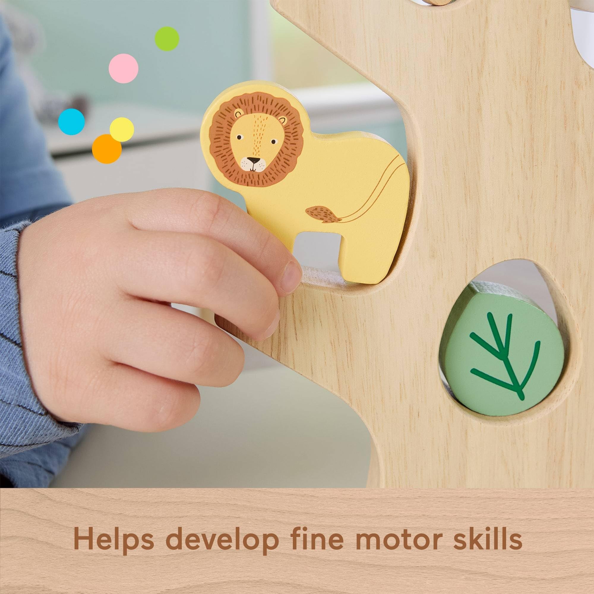 Fisher-Price Wooden pieces in a colorful setup showcase FSC-certified craftsmanship