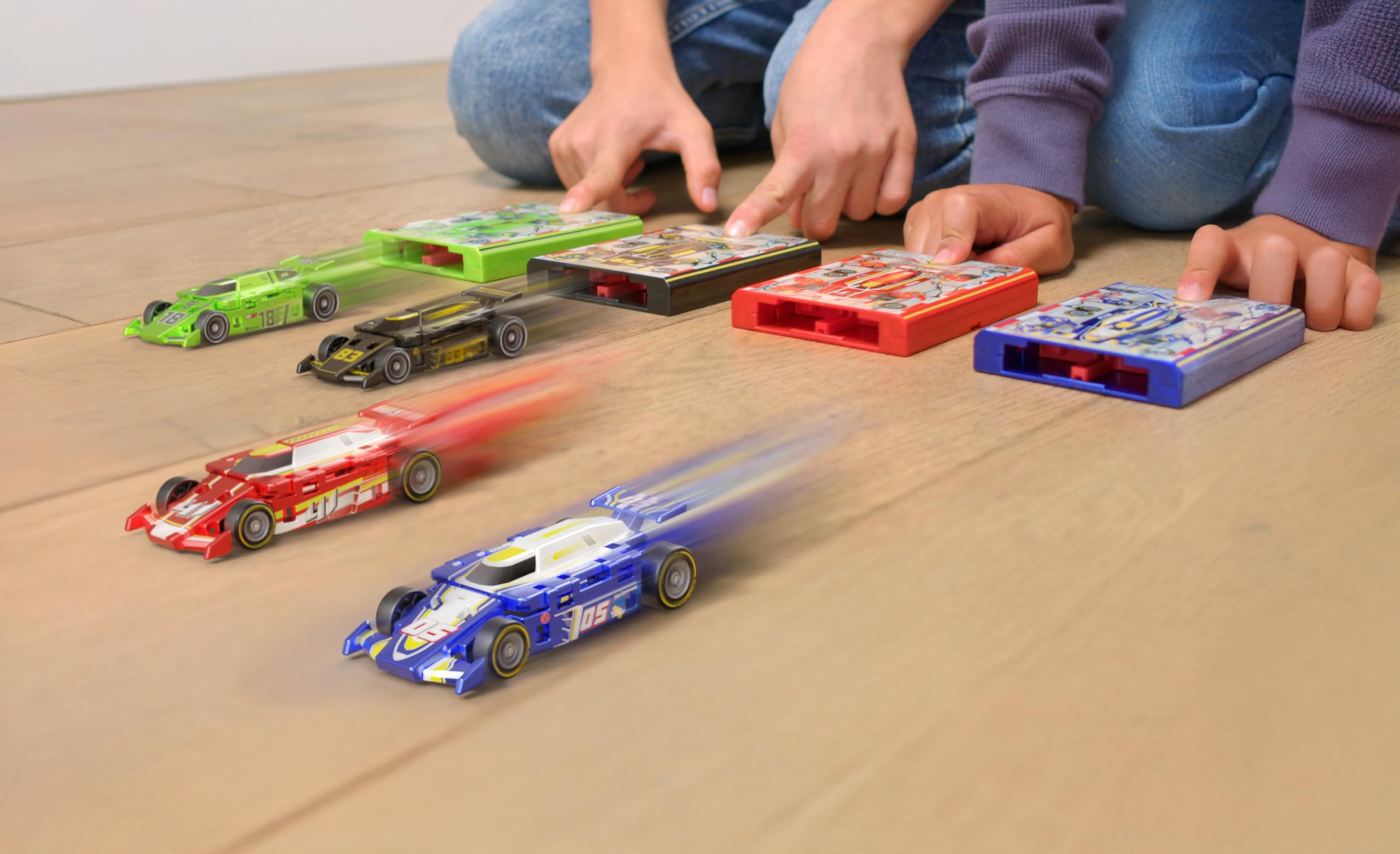FLAT 2 FAST open-wheel design with real rubber tires for grip.