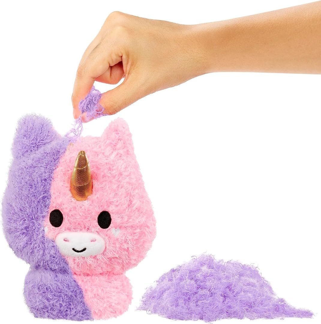 Fluffie Stuffiez surprise reveal unicorn shows the hidden character during unboxing.