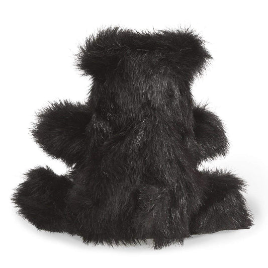 Folkmanis Baby Black Bear puppet in-hand action shows easy manipulation for kids.