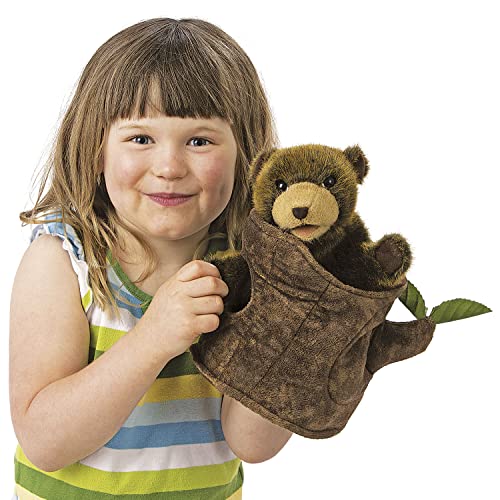 Folkmanis Bear-in-Tree-Stump puppet woodland design enhances storytelling ambience.