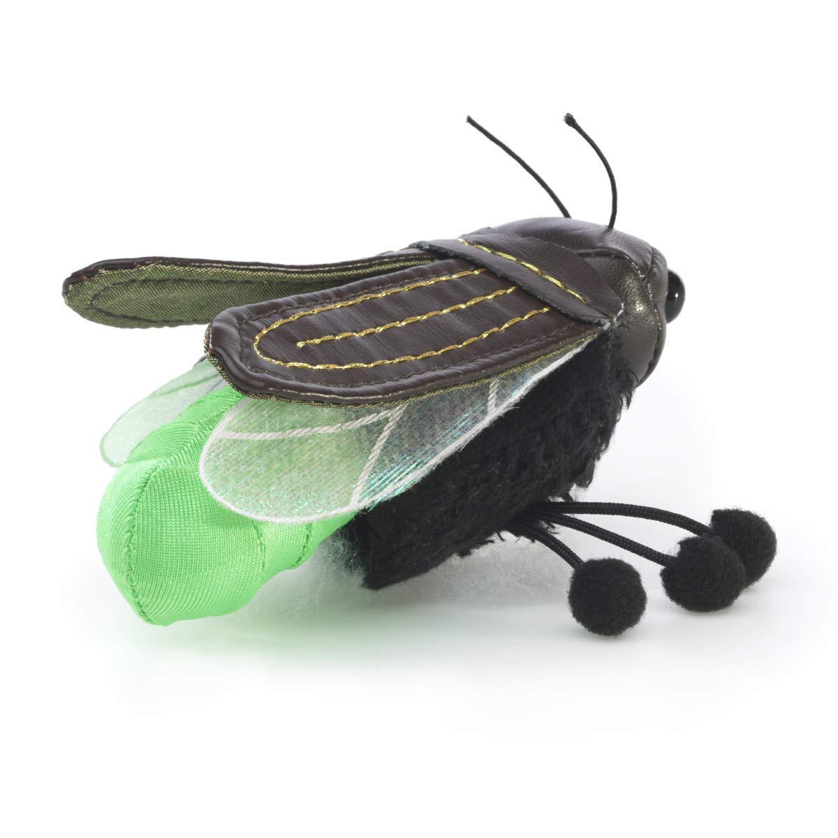 Close-up of glow switch on Folkmanis Mini Firefly for ambient storytelling.