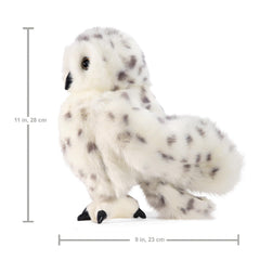Folkmanis Snowy Owl suitable for ages 3+, encouraging imaginative play.