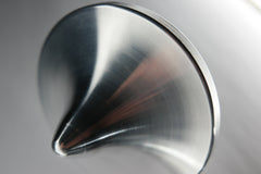 ForeverSpin brush finish close-up reveals smooth texture and balanced weight.