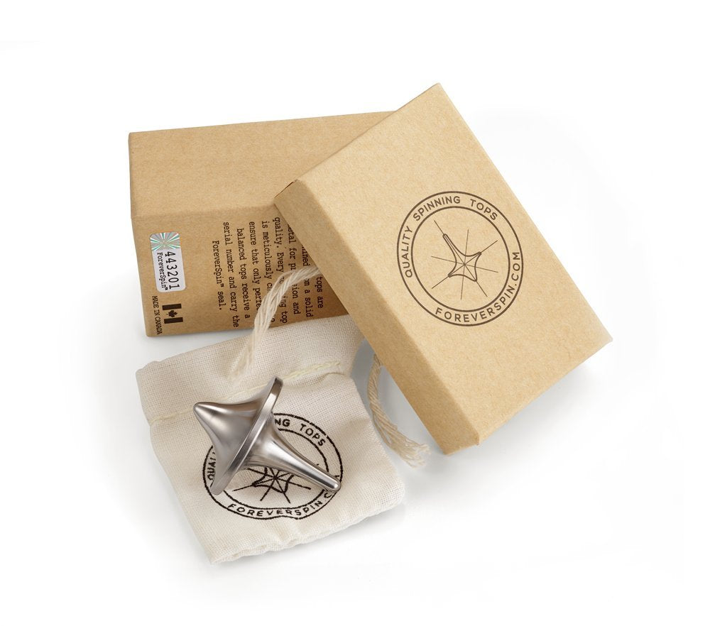 ForeverSpin titanium top in hand with tactile weight for satisfying spins