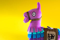 Fortnite Llama Loot Plush side view highlights collectible charm and cuddle appeal.