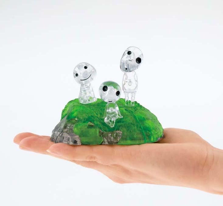 FOXCUP Kodama puzzle assembled on a stand showcases the clear, glass-like finish.