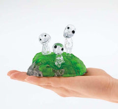 FOXCUP Kodama puzzle assembled on a stand showcases the clear, glass-like finish.