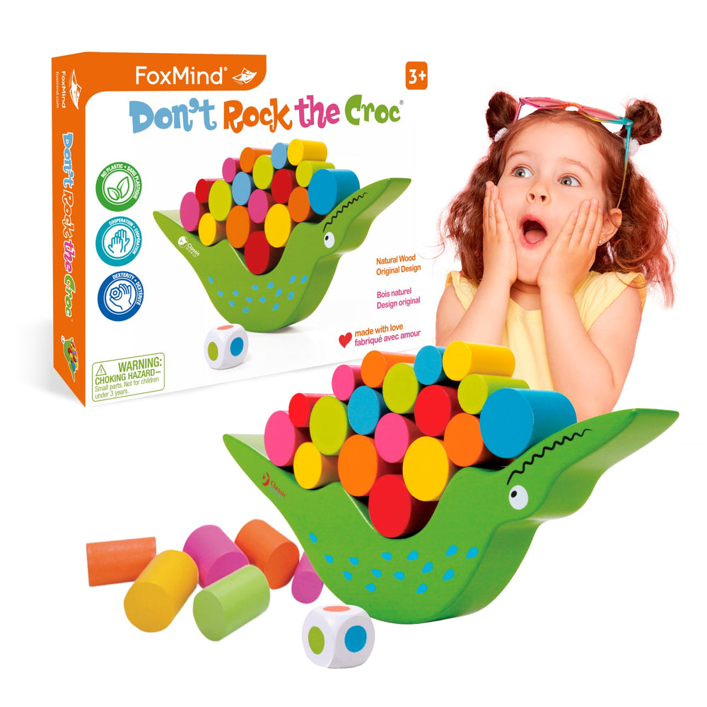 Colorful wooden cylinders for stacking, FoxMind enhances fine motor skills.