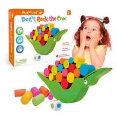 Colorful wooden cylinders for stacking, FoxMind enhances fine motor skills.