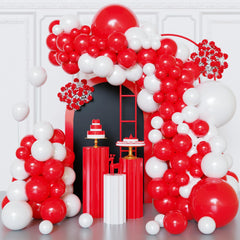 FQZYLCH red and white balloon arch kit setup creates a festive backdrop