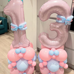 Froova giant number 1 balloon display for a first birthday, photo-ready backdrop