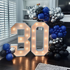 Froova silver confetti balloons create festive texture and surprise.