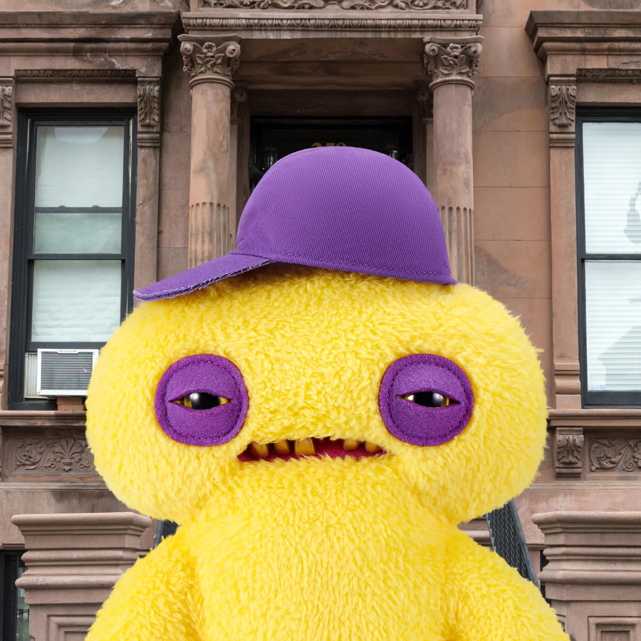 Fuggler with human-like teeth grin for dramatic, playful display.
