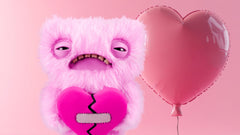 Fuggler Love Fugg pink plush body invites soft hugs and expressive posing.