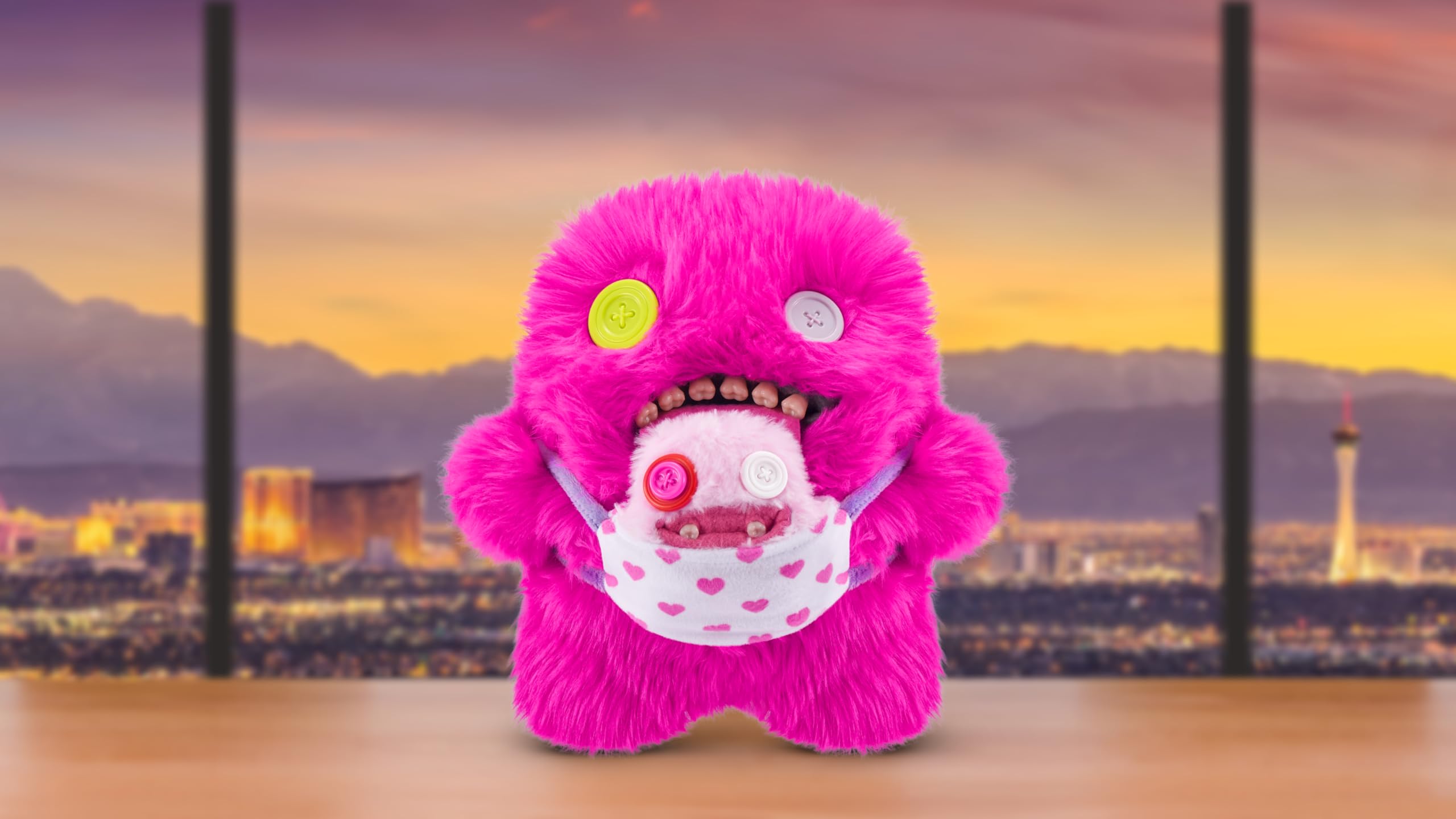 Fuggler mini rascal Oogah Boogah pink long pile plush offers soft texture and snuggly fun.