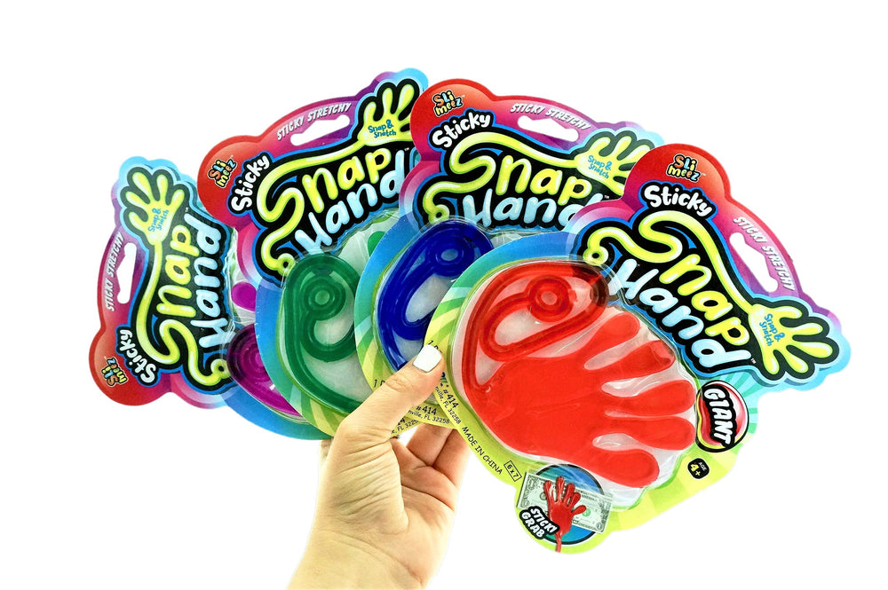 Fun a Ton blue giant snap hand demonstrates wall-sticking play and stress-relief for kids.