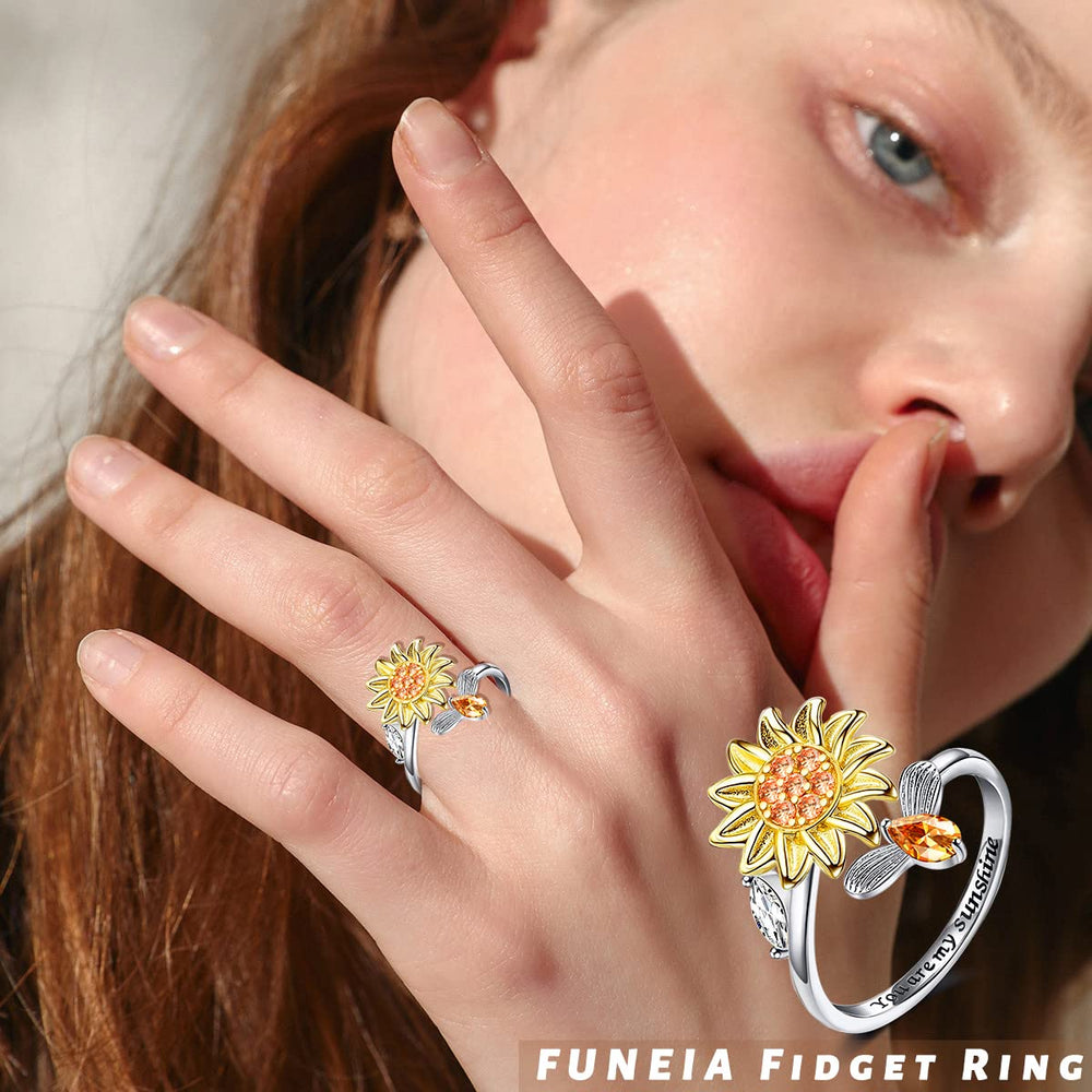 FUNEIA fidget ring flower bee design blends whimsy with calm fidgeting.