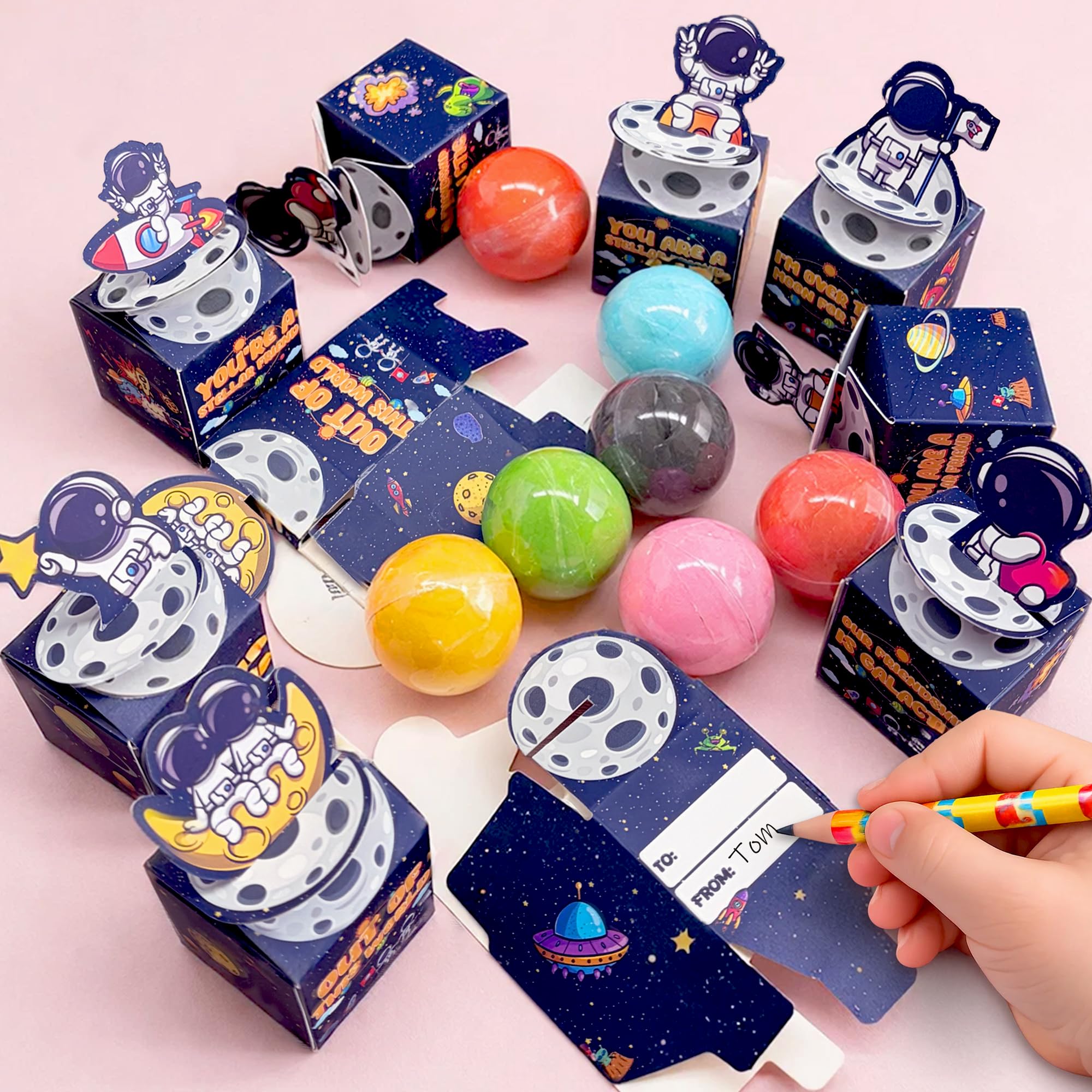 Funewest space astronaut Valentine cards paired with vivid slime toys for engaging school celebrations.