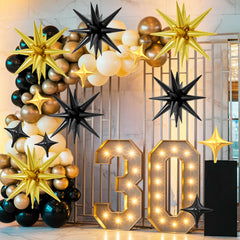FunHot 10-inch black four-point star balloon complements metallic decor