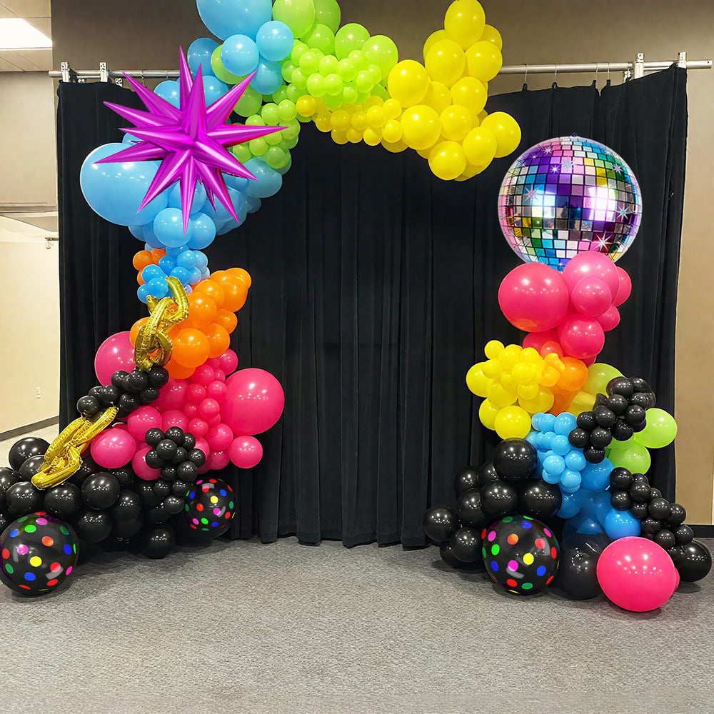 FunHot neon-dot balloons sparkle under lights for backdrop.