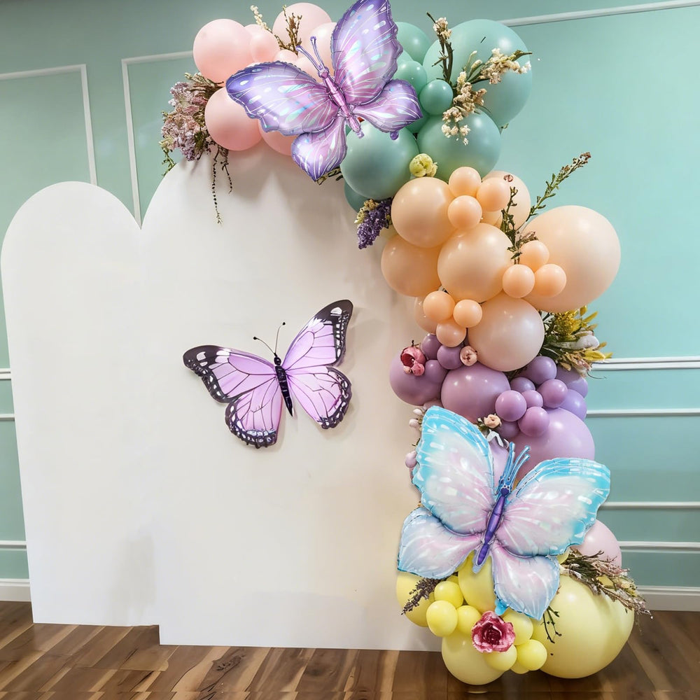 FunHot pastel balloon arch idea with butterfly motifs for photo-worthy setup