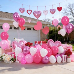 FunHot pink heart balloons ideal for bridal entrances and engagement parties.
