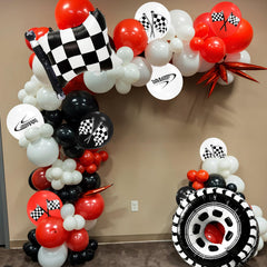 FunHot red checkered balloons add vibrant racing accents.