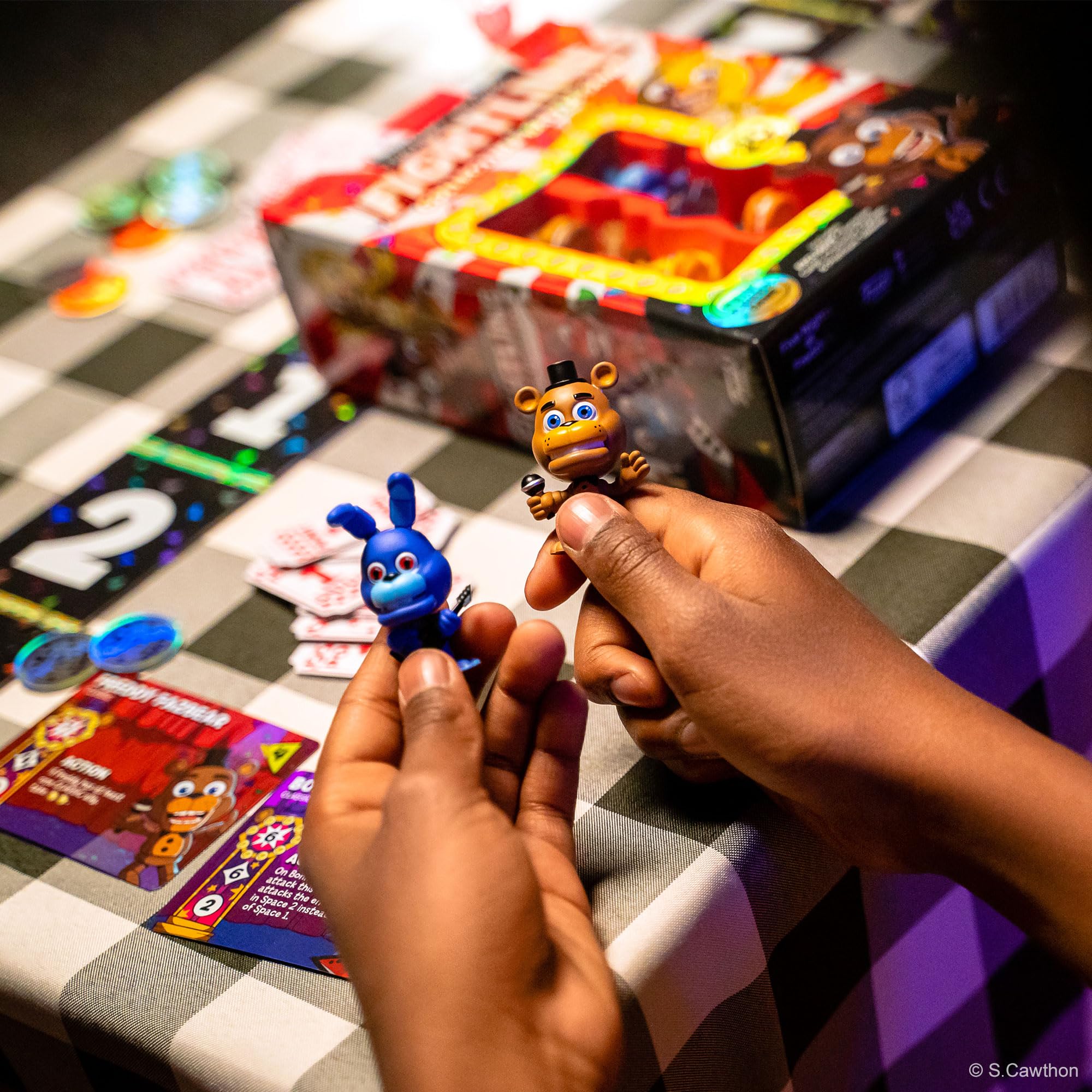 Box front displaying two-player setup and exclusive figures