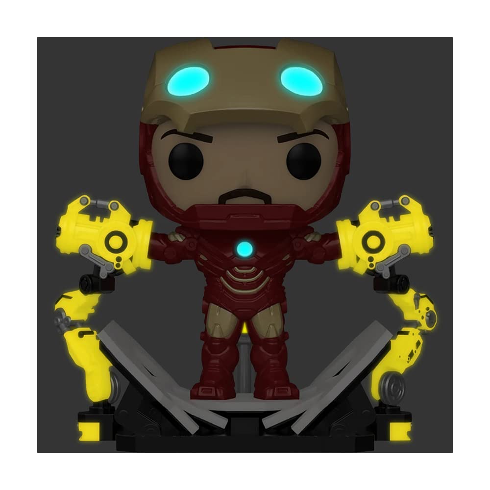 Funko Iron Man 2 MKIV glow-in-the-dark parts illuminate the display.