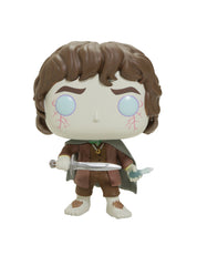 Funko Frodo Spirit Form on desk setup with LOTR background