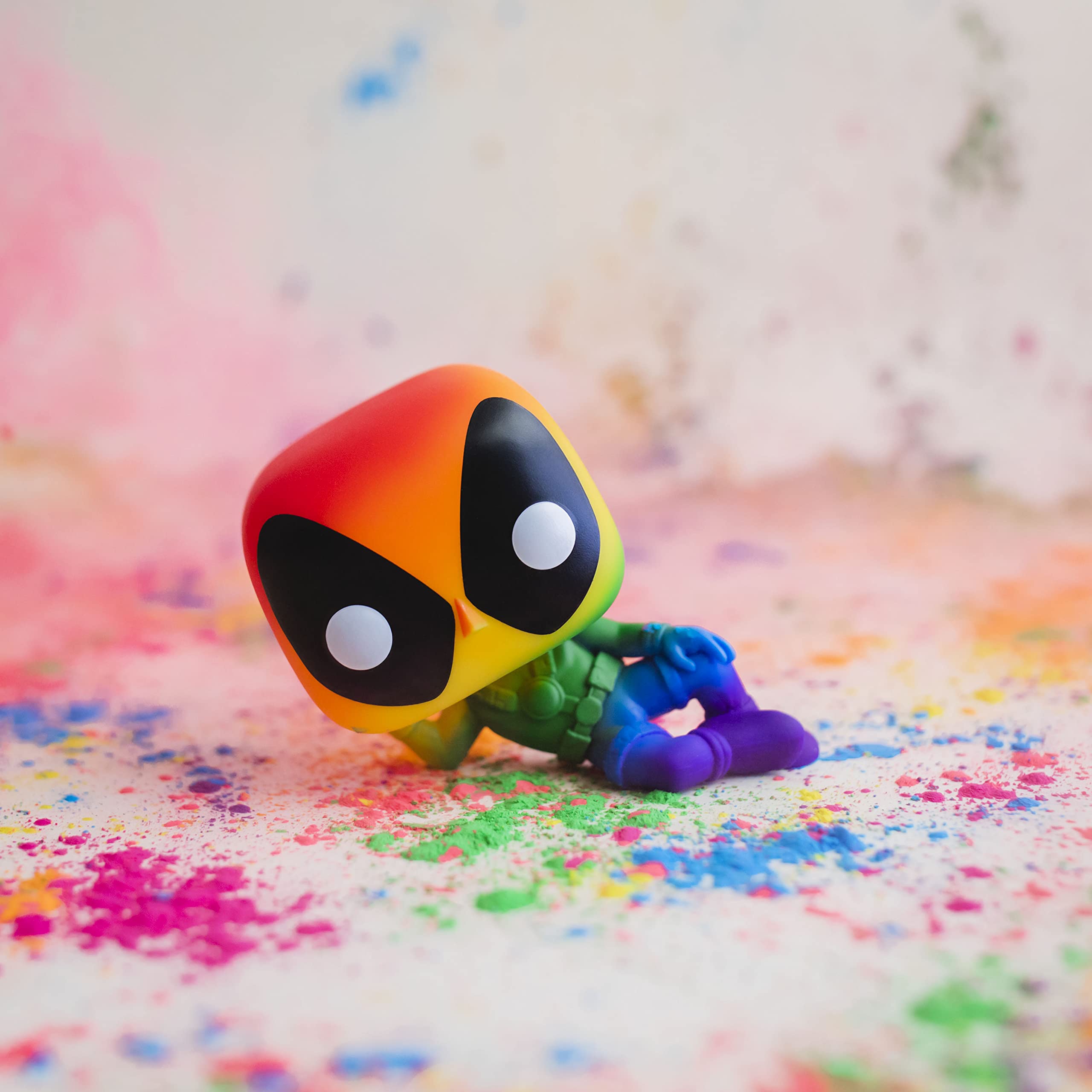 Funko Pride Deadpool rainbow vinyl adds collector value to desk or shelf.