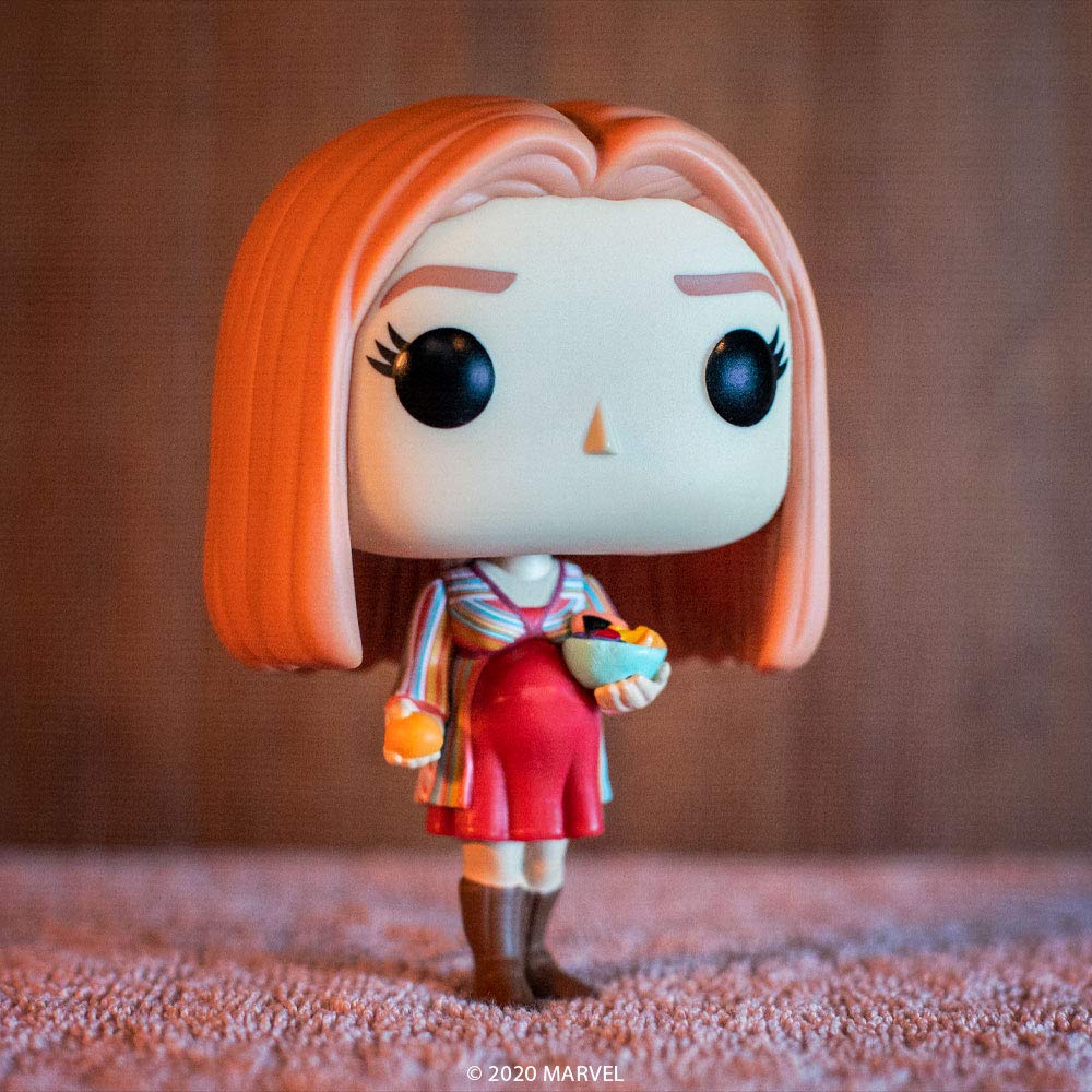 Funko Pop Marvel WandaVision Wanda in groovy outfit enhances any Marvel collection centerpiece.