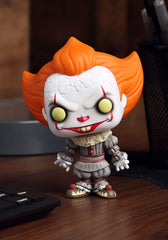 Funko Pop Pennywise open arms closeup shows intricate sculpt for collectors