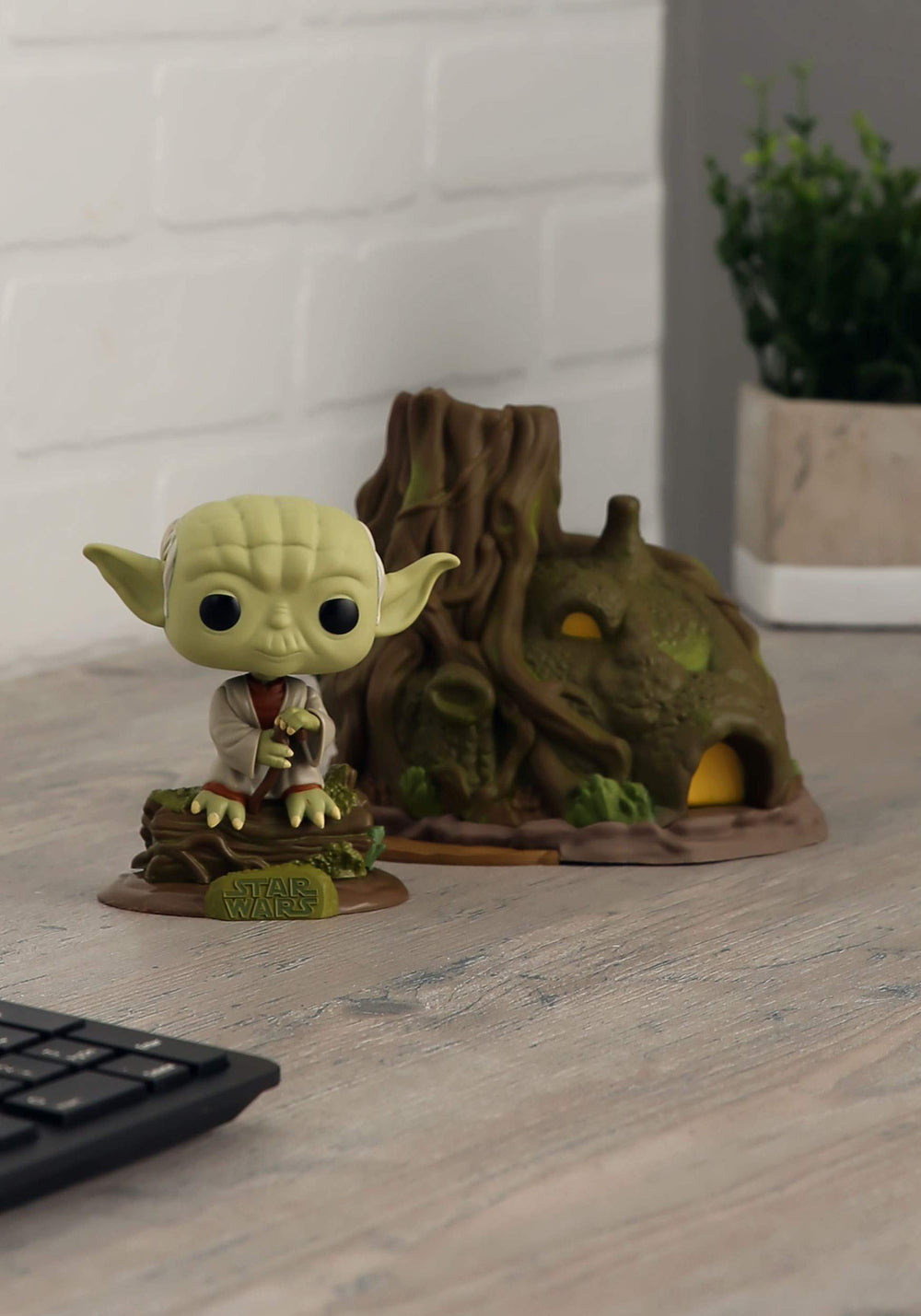 Funko Pop! Town Yoda's Hut pose captures an iconic scene for displays.
