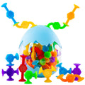 Funny Old Man 48-piece bath toys with dinosaur eggshell storage for engaging bath play.