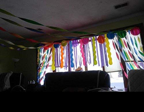 FUNPRT party decor scene with arches and colorful backdrops for celebrations.