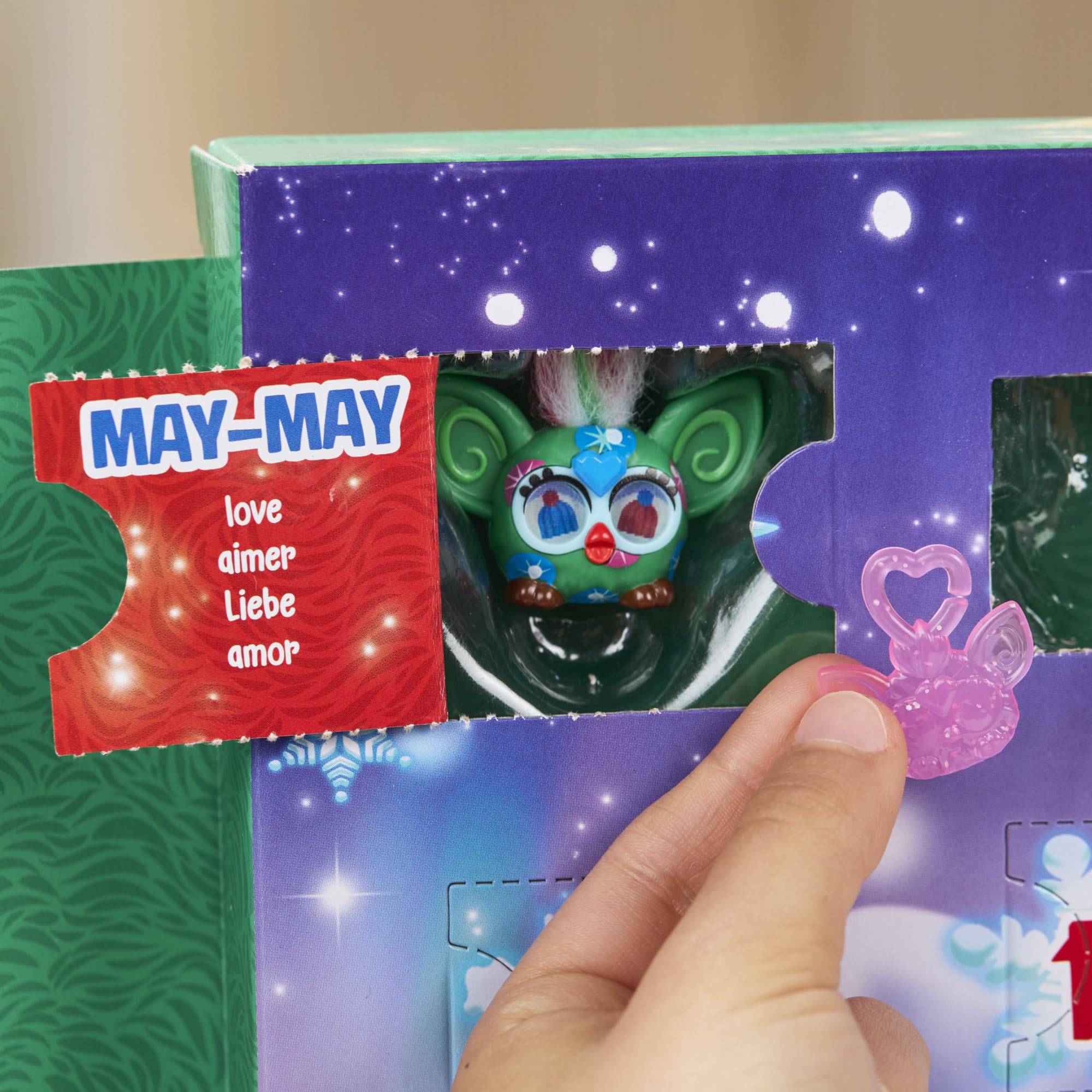 Furby Minis perforated doors invite daily unboxing excitement.