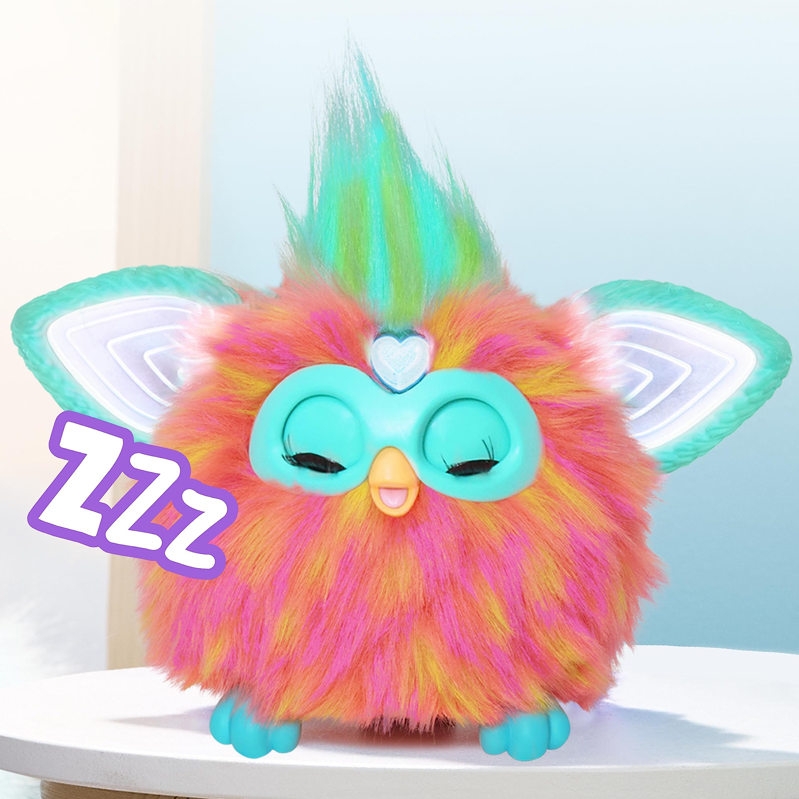 Furby Coral wearing clip-on beads for creative fashion styling.