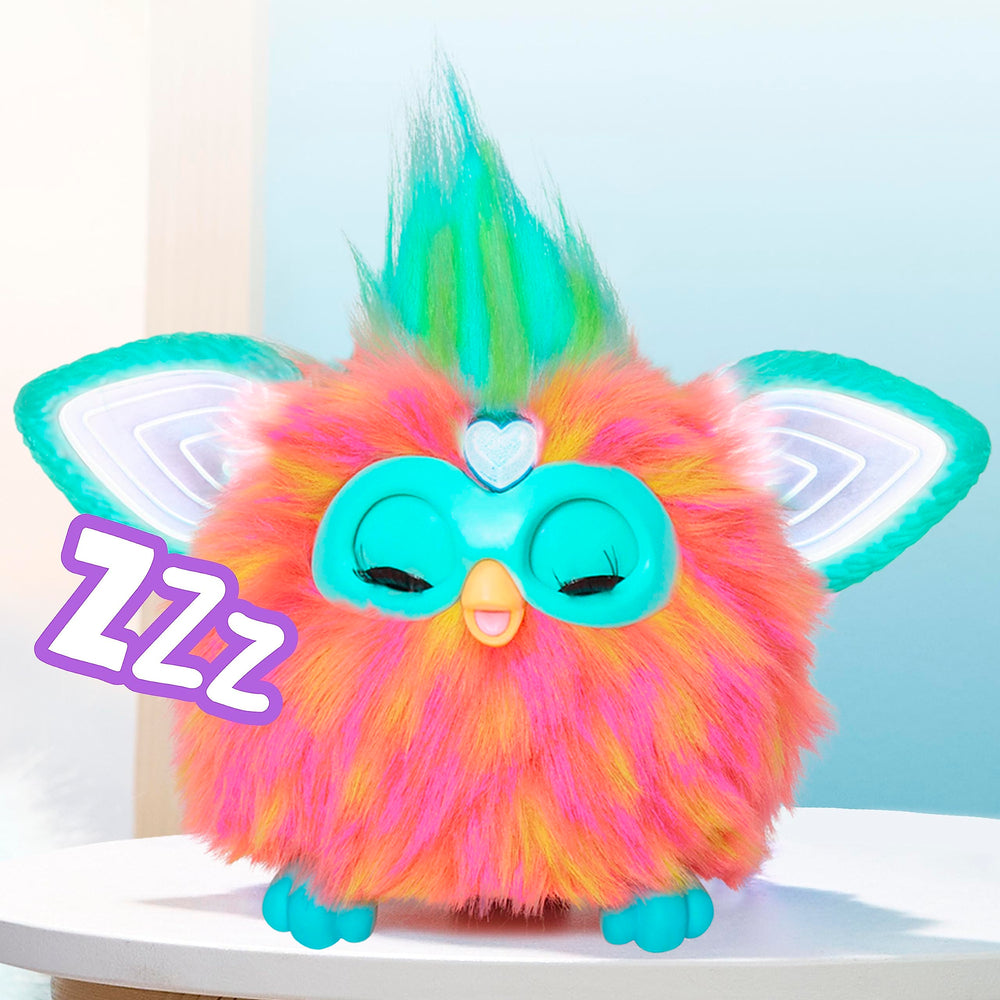 Furby Coral wearing clip-on beads for creative fashion styling.