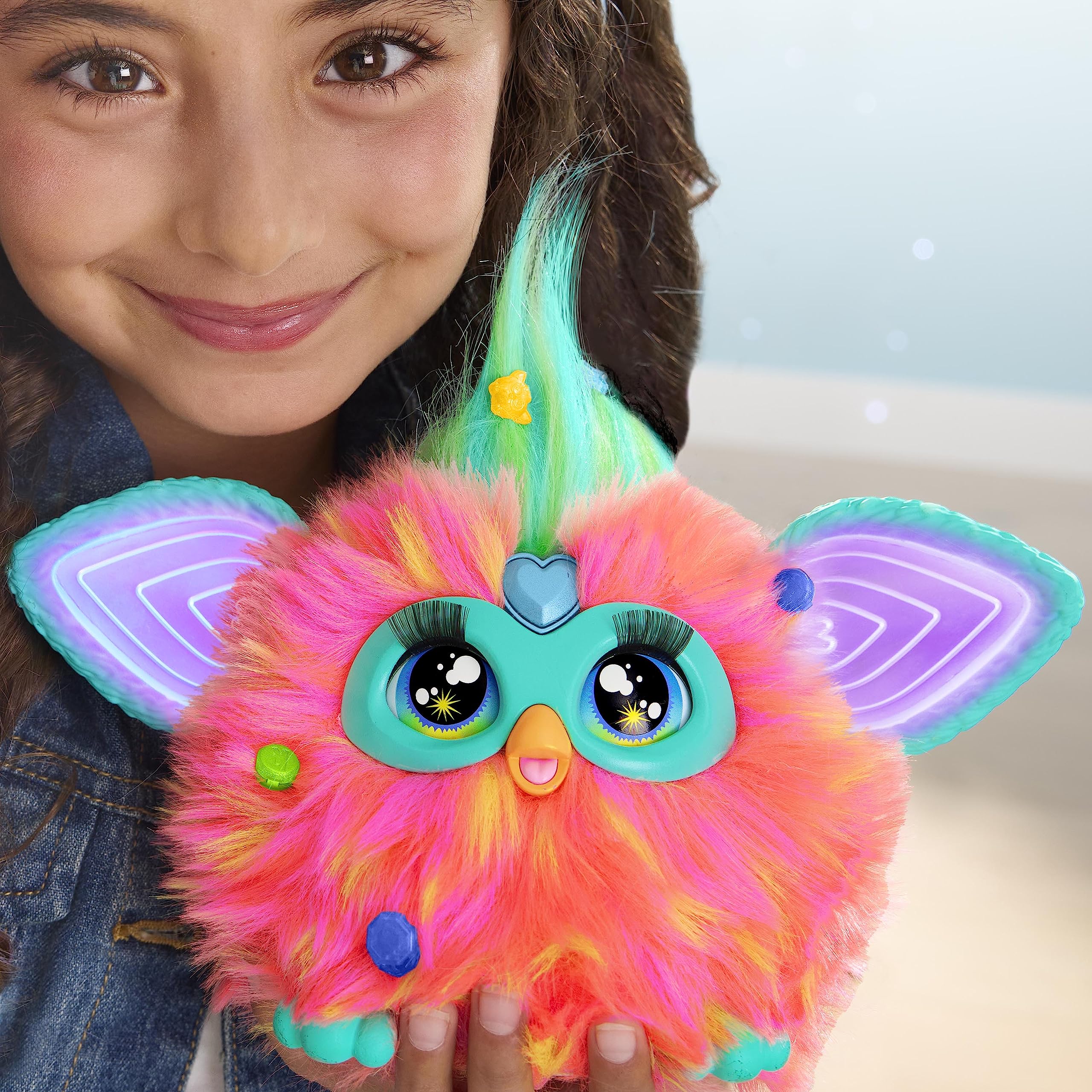 Two Furby Corals interact for shared storytelling experiences.