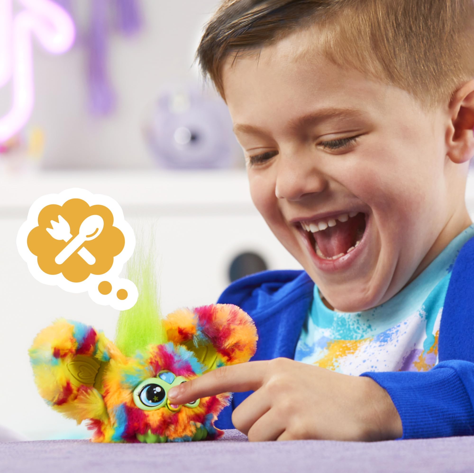 Furby Furblets beak activation triggers music and sounds on demand.