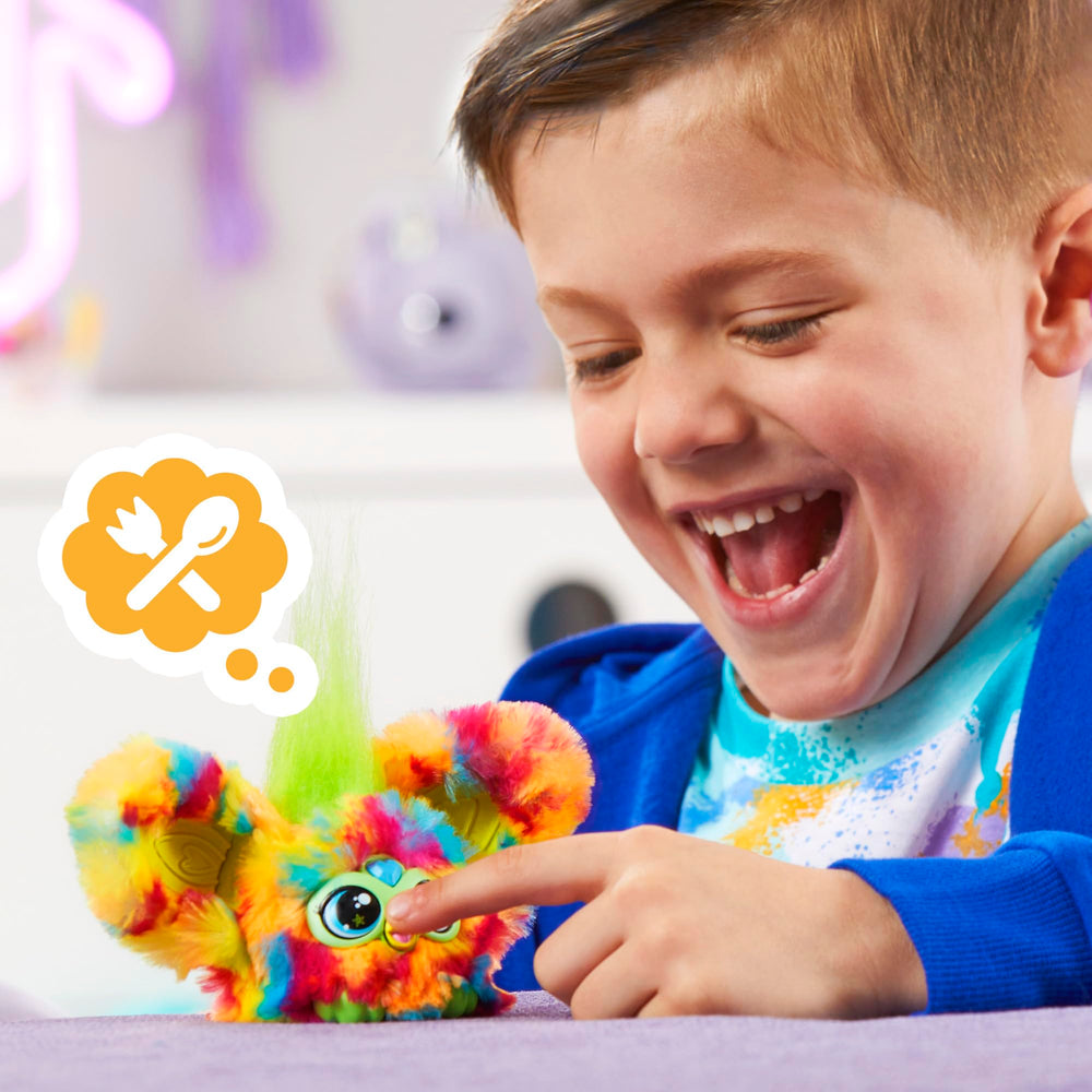 Furby Furblets beak activation triggers music and sounds on demand.