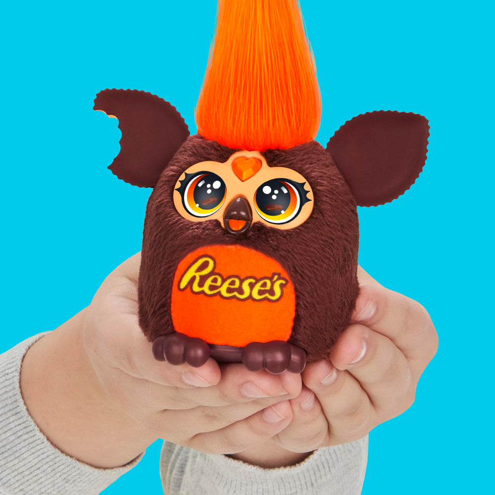 Close look at Furby Furblets Reese's cup display in a pretend cup.